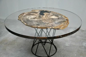 ANTICO TRENTINO Низкий круглый журнальный столик из полимера Tavoli in legno pietrificato