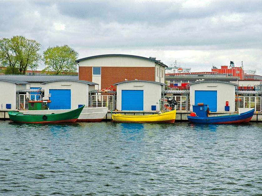 WISNIOWSKI Вертикальная раздвижная дверь Portoni sezionali industriali sun-id-1473992 - Вид №2