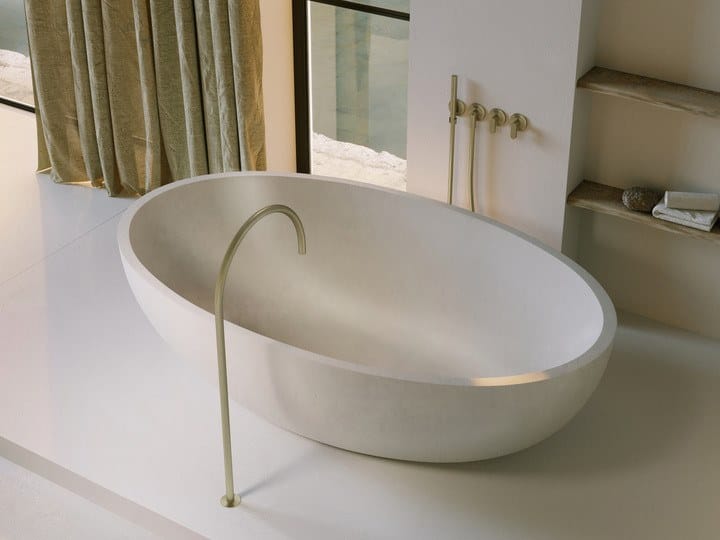 Облегченная бетонная овальная ванна в центре комнаты COCOON Maison ARCH-00025679