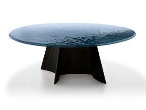 Круглый обеденный стол из железа и стекла