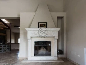 GH LAZZERINI Дровяной камин из натурального камня на стене