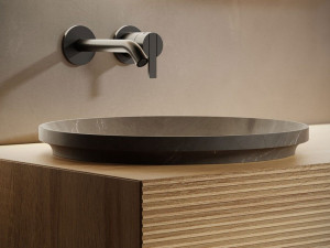Полукруглый мраморный умывальник