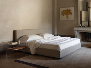 Upholstered bed with removable cover